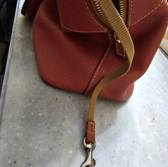 Beautiful red leather Dooney & Bourke purse with crossbody option